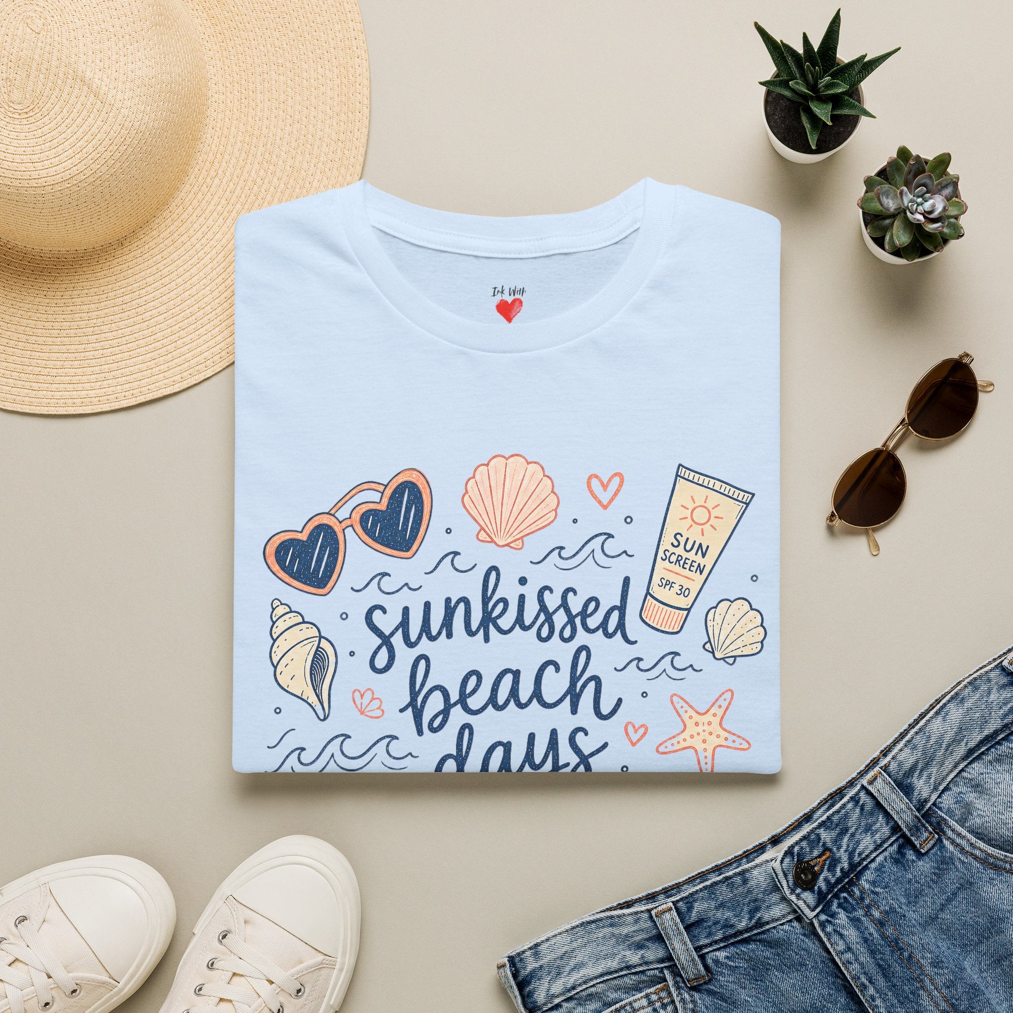 T-Shirt — Sunkissed Beach Days Graphic Tee (Seashells, Sunglasses & Sunblock)
